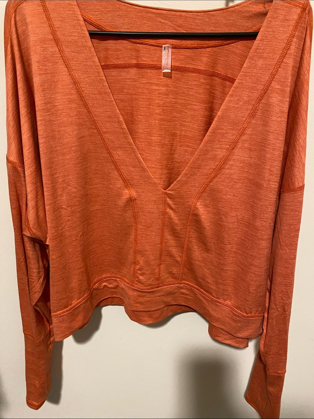 NWT FP Movement by Free People Deep V Pullover Top in Orange